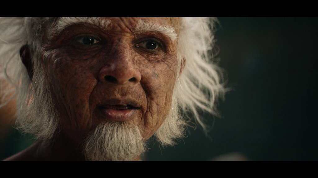 King Bumi (Utkarsh Ambudkar) remembers the true meaning of friendship in Avatar: The Last Airbender Season 1 Episode 4 "Into the Dark" (2024), Netflix