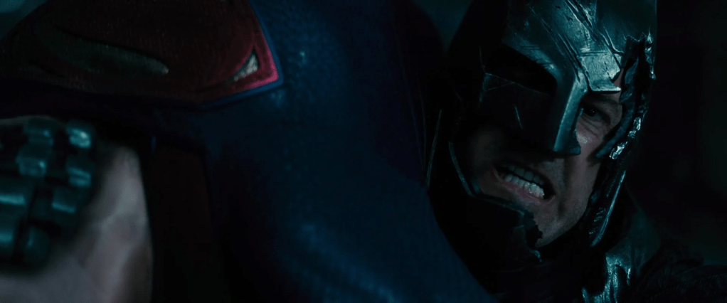 Batman (Ben Affleck) prepares to suplex Superman (Henry Cavill) in Batman v Superman - Dawn of Justice: Ultimate Edition (2016), Warner Bros. Pictures