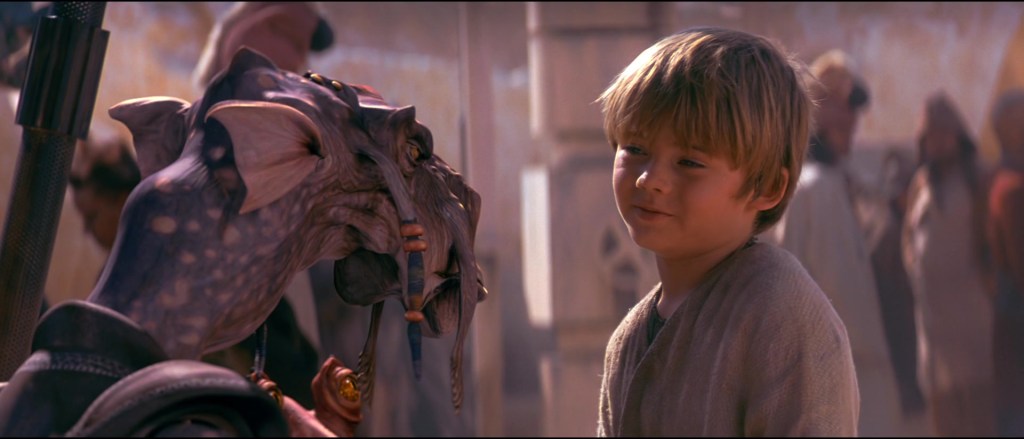 Anakin Skywalker (Jake Lloyd) tells Sebublba (Lewis McLeod) to kick rocks in Star Wars: Episode I - The Phantom Menace (1999), Lucasfilm