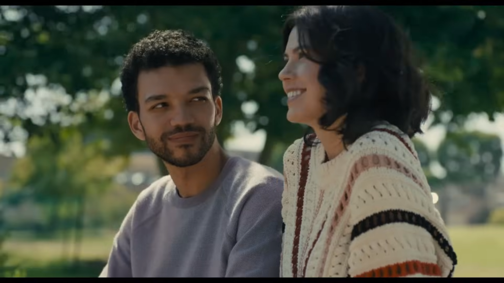 Justice Smith as Aren and An-Li Bogan as Lizzy in The American Society of Magical Negroes (2022) , Focus Features