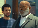 Justice Smith as Aren and David Alan Grier as Roger in The American Society of Magical Negroes (2024), Focus Features