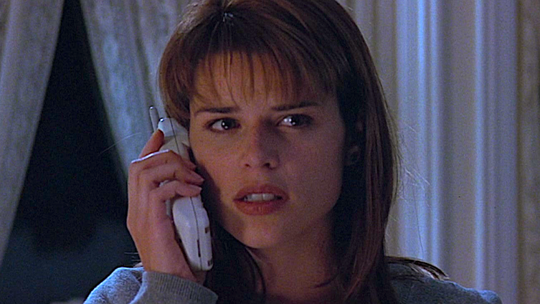 Sidney Prescott (Neve Campbell) has her first interaction with Ghostface in Scream (1996), Paramount Pictures