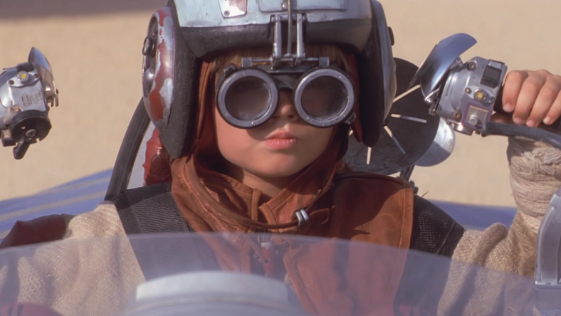 Anakin Skywalker (Jake Lloyd) knows that THIS is pod racing in Star Wars: Episode I - The Phantom Menace (1999), Lucasfilm