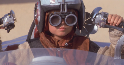 Anakin Skywalker (Jake Lloyd) knows that THIS is pod racing in Star Wars: Episode I - The Phantom Menace (1999), Lucasfilm