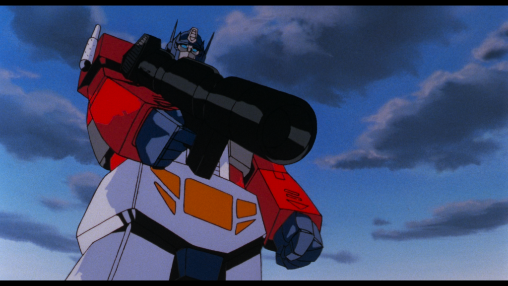 Optimus Prime (Peter Cullen) is ready to put an end to Megatron (Frank Welker) in The Transformers: The Movie (1986), Sunbow Productions