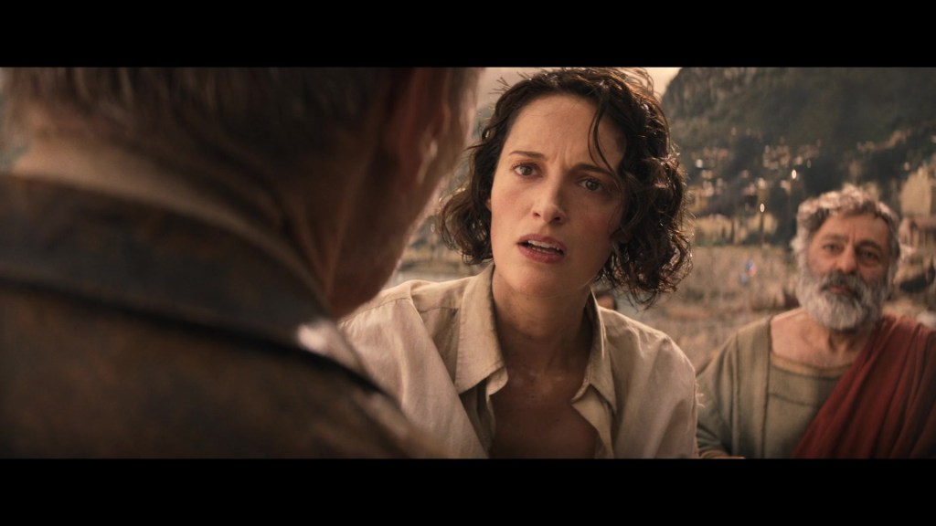 Helena (Phoebe Waller-Bridge) scrambles to convince Indy (Harrison Ford) to return to the present in Indiana Jones and the Dial of Destiny (2023), Lucasfilm