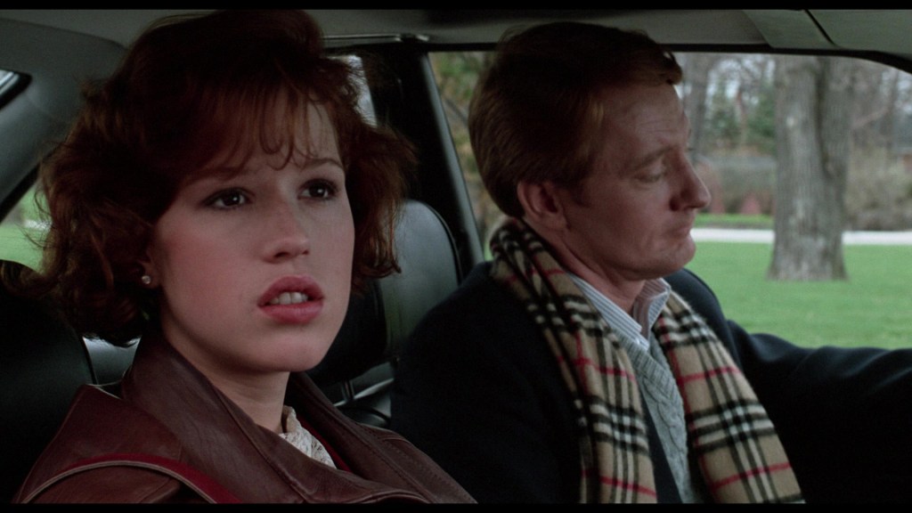 Claire (Molly Ringwald) is dropped off for detention in The Breakfast Club (1985), Universal Pictures