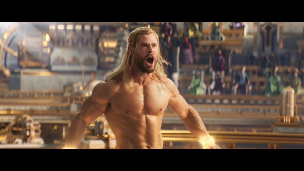 Thor (Chris Hemsworth) has a wardrobe malfunction in Thor: Love and Thunder (2022), Marvel Entertainment.