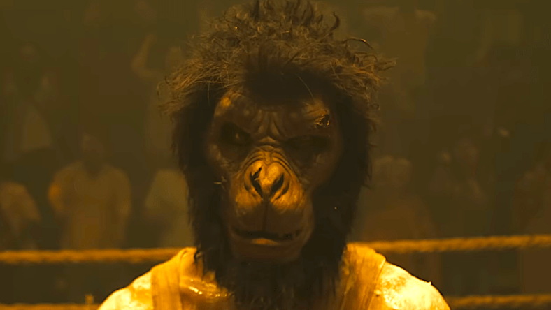 Dev Patel dons the monkey mask as Kid in Monkey Man (2024), Bron Studios