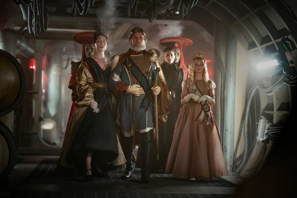 Rebel Moon — Part Two: The Scargiver. (Featured L-R) Rhian Rees as The Queen, Cary Elwes as The King, Sofia Boutella as Kora and Stella Grace Fitzgerald as Princess Issa in Rebel Moon — Part Two: The Scargiver. Cr. Clay Enos/Netflix ©2023.