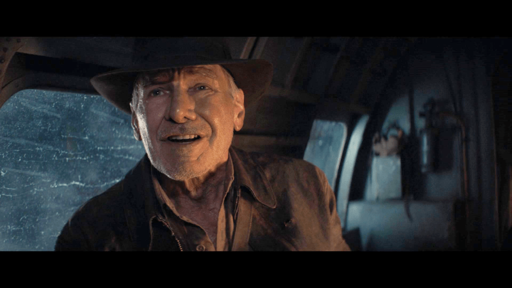 Indy (Harrison Ford) realizes Voller (Mads Mikkelsen) has ignored the concept of continental drift in Indiana Jones and the Dial of Destiny (2023), Lucasfilm
