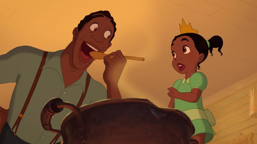 James (Terrence Howard) tries a bite of Tiana's (Anika Noni Rose) cooking in The Princess and the Frog (2009), Disney