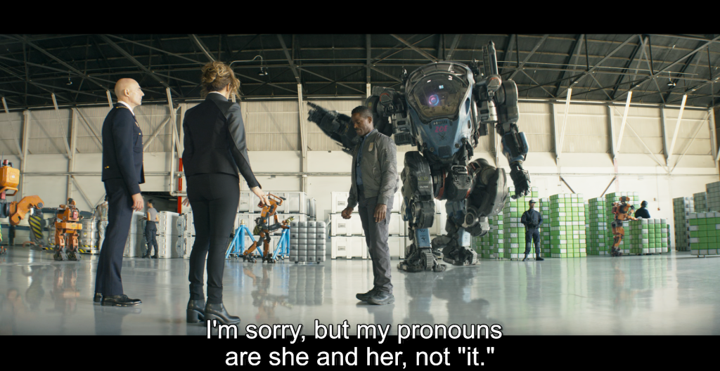 Zoe (Zoe Boyle) corrects Agent Shepherd (Jennifer Lopez) on her pronoun usage in Atlas (2024), Netflix