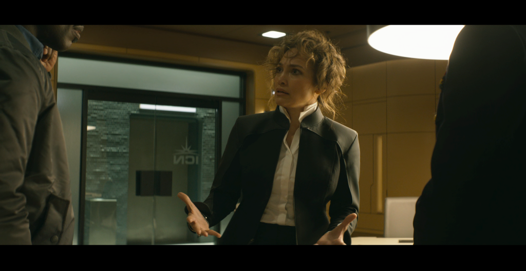 Agent Shepherd (Jennifer Lopez) urges the ICN to completely eliminate Harlan (Simu Liu) in Atlas (2024), Netflix