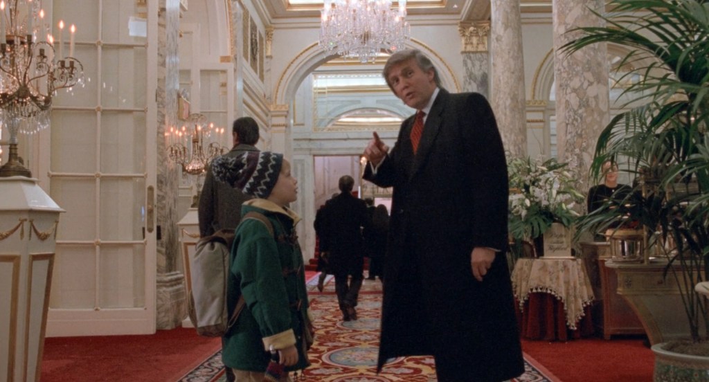 Kevin (Macaulay Culkin) ask Donald Trump for directions in Home Alone 2: Lost in New York (1992), 20th Century Fox
