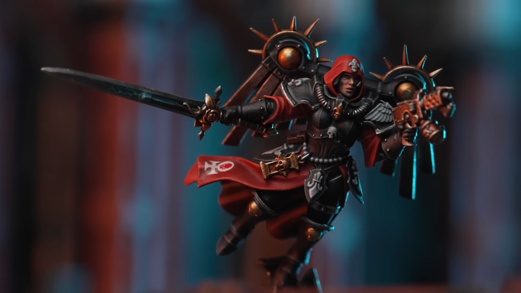 An Adepta Sororitas Cannoness descends upon the battlefield in Warhammer 40K (1987), Games Workshop