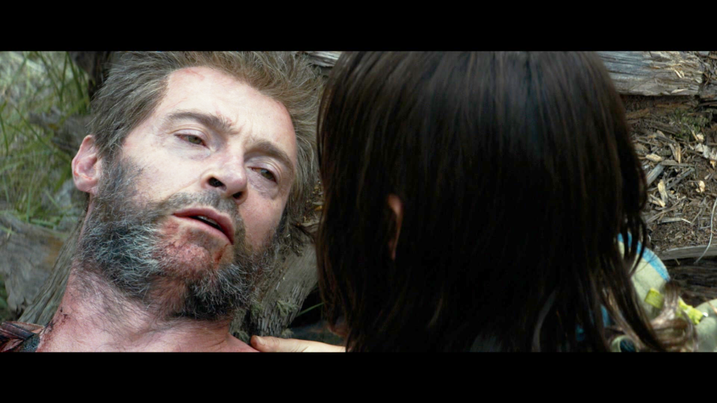 Wolverine (Hugh Jackman) says good-bye to X-23 (Dafne Keen) in Logan (2017), Marvel Entertainment