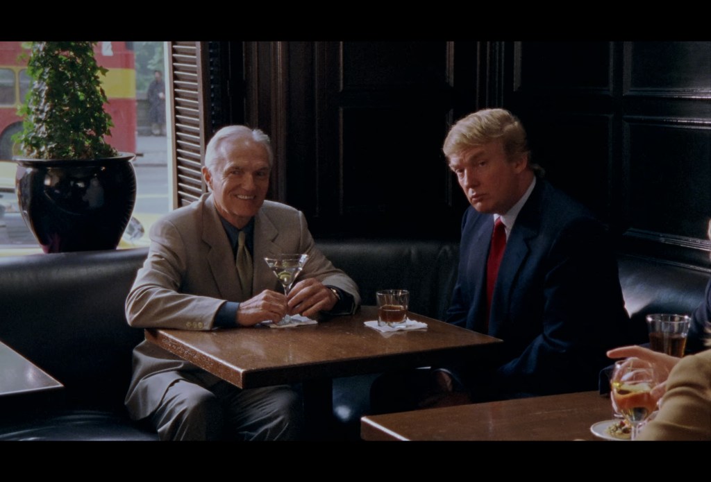 Ed (Bill McHugh) has a business meeting with Donald Trump in Sex and the City Season 2 Episode 8 