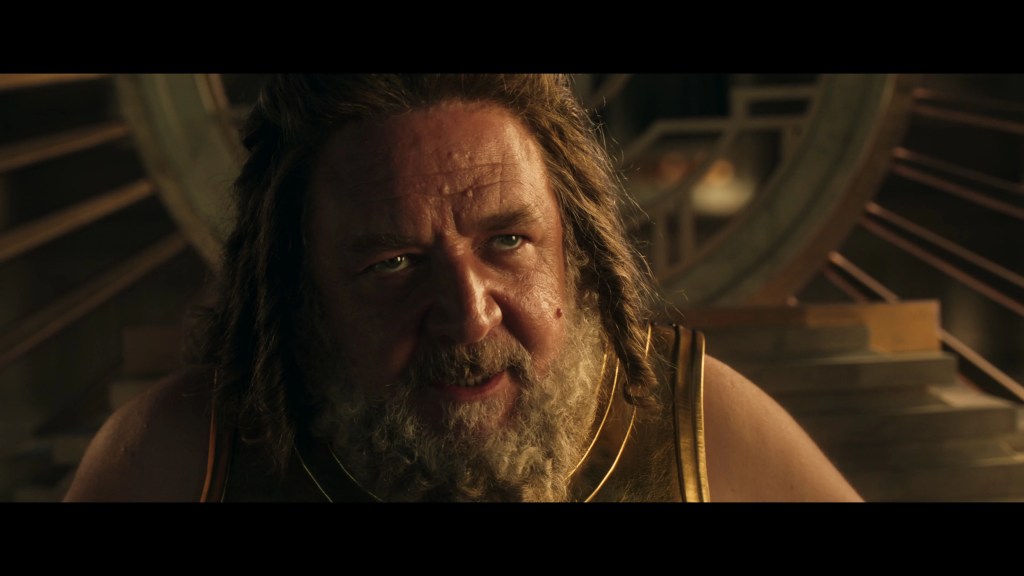 Zeus (Russell Crowe) has a mission for his son Hercules (Brett Goldstein) in Thor: Love and Thunder (2022), Marvel Entertainment