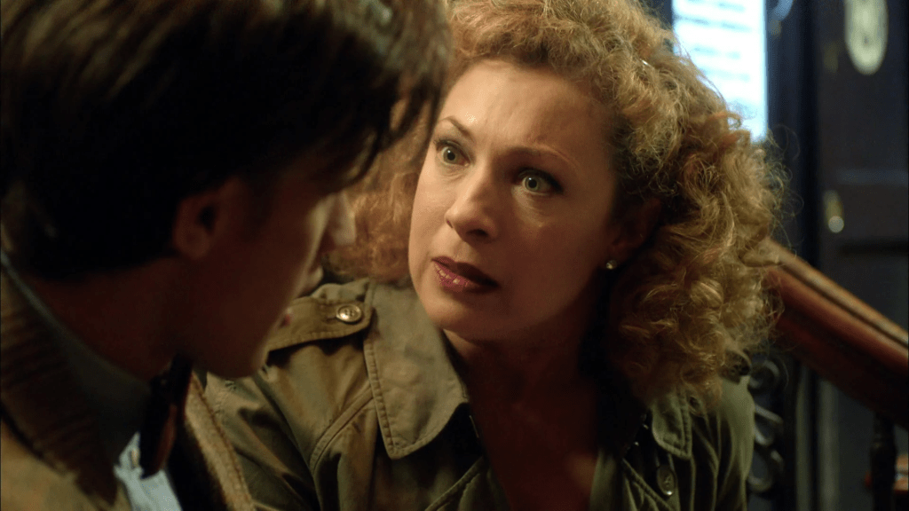 River Song (Alex Kingston) chastises The Doctor (Matt Smith) for expending what little energies he has left to heal her wounds in Doctor Who Series 7 Episode 5 "The Angels Take Manhattan" (2012), BBC