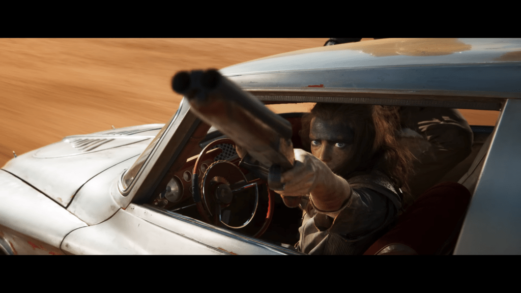 Furiosa (Anya Taylor-Joy) gets ready to take her shot in Furiosa: A Mad Max Saga (2024), Warner Bros. Pictures