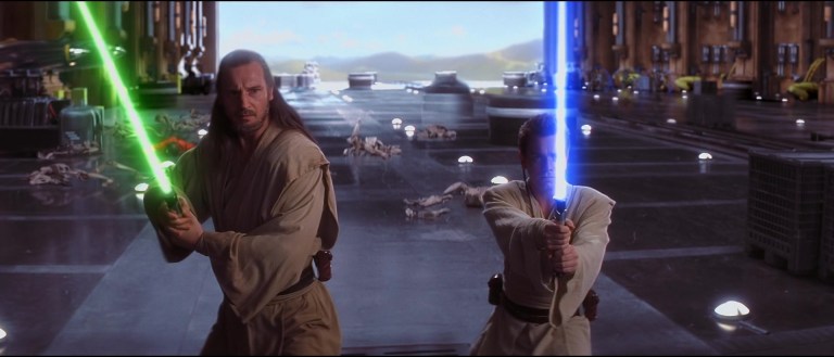 Qui-Gon Jinn (Liam Neeson) and Obi-Wan Kenobi (Ewan McGregor) prepare for a showdown with Darth Maul (Ray Park) in Star Wars: Episode I - The Phantom Menace (1999), Lucasfilm