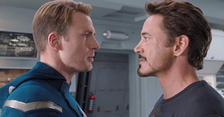 Steve Rogers (Chris Evans) and Tony Stark (Robert Downey Jr.) are at odds in The Avengers (2012), Marvel Studios