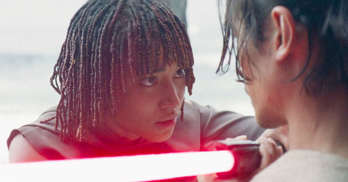 Osha (Amandla Stenberg) brings Qimir's (Manny Jacinto) lightsaber to his own throat in The Acolyte Season 1 Episode 6 'Teach/Corrupt' (2024), Disney