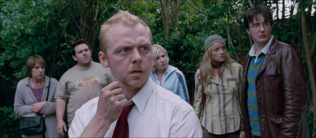 Shaun (Simon Pegg) realizes how his group can move through a horde of zombies in Shaun of the Dead (2004), Universal Pictures