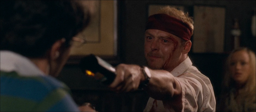 Shaun (Simon Pegg) cannot deal with the realities of his mother's (Penelope Wilton) death in Shaun of the Dead (2004), Universal Pictures