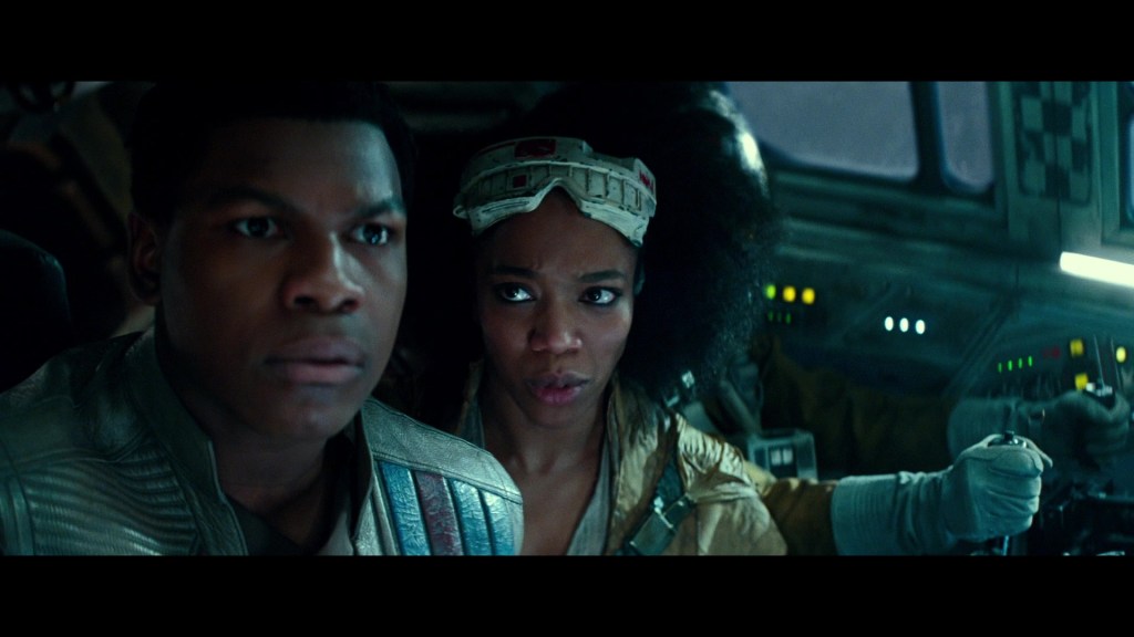 Jannah (Naomi Ackle) and Finn (John Boyega) find themselves out of options for stopping the Exegol Star Destroyers in Star Wars Episode IX: The Rise of Skywalker (2019), Lucasfilm