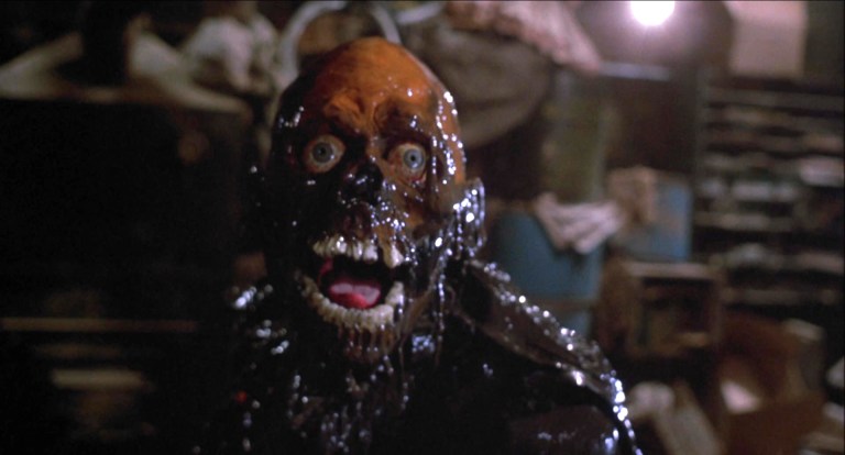 More brains for the Tarman (Allan Trautman) in The Return of the Living Dead (1985), MGM