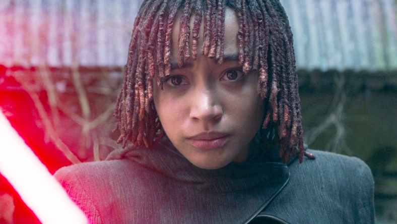 Osha (Amandla Stenberg) wields Master Sol's (Lee Jung-jae) now-red lightsaber in The Acolyte Season 1 Episode 8 "The Acolyte" (2024), Disney