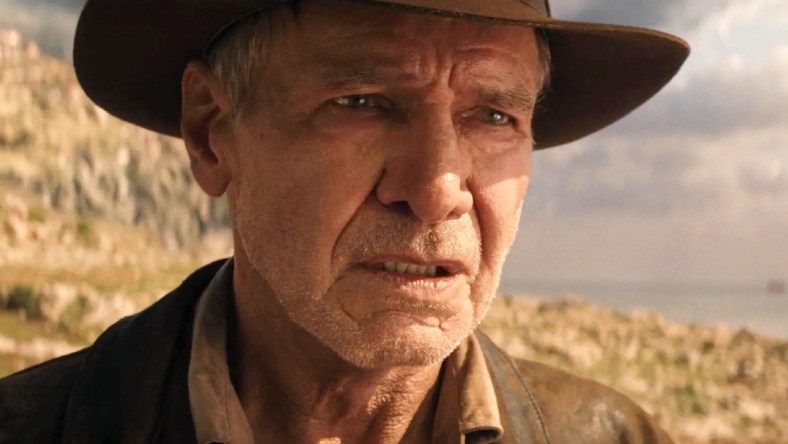 Indy (Harrison Ford) begs Helena (Phoebe Waller-Bridge) to let him stay in the past in Indiana Jones and the Dial of Destiny (2023), Lucasfilm