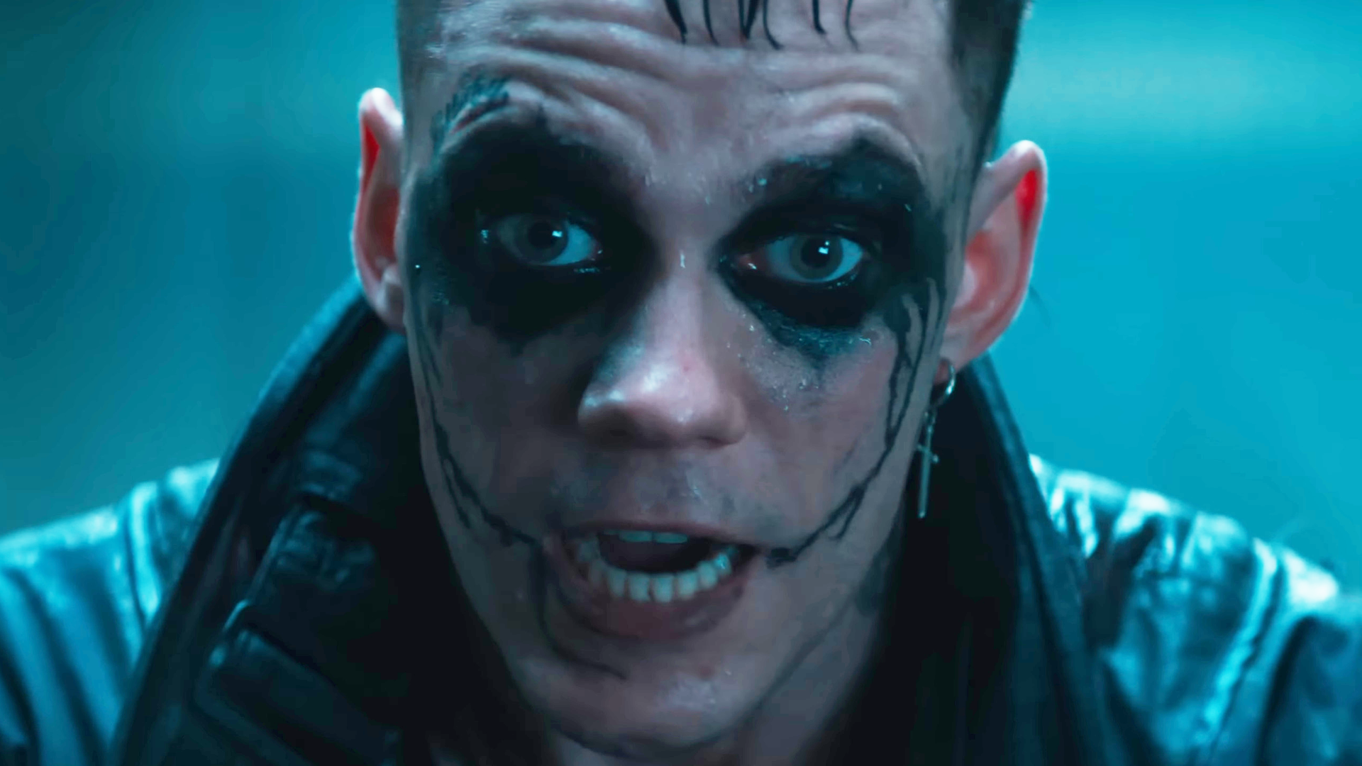 A bloodied Eric Draven (Bill Skarsgard) taunts his next opponent in The Crow (2024), Lionsgate