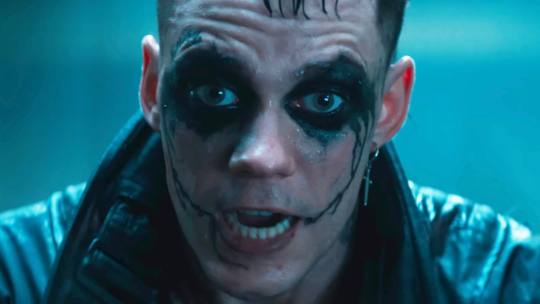 A bloodied Eric Draven (Bill Skarsgard) taunts his next opponent in The Crow (2024), Lionsgate