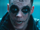 A bloodied Eric Draven (Bill Skarsgard) taunts his next opponent in The Crow (2024), Lionsgate