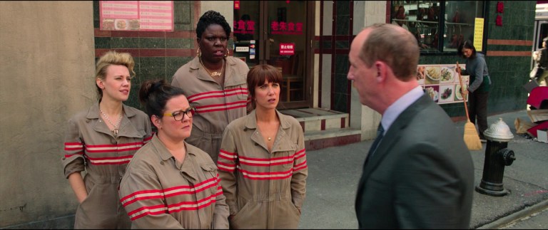 The titular team receives a dressing down from Agent Rourke (Matt Walsh) in Ghostbusters: Answer The Call (2016), Sony Pictures