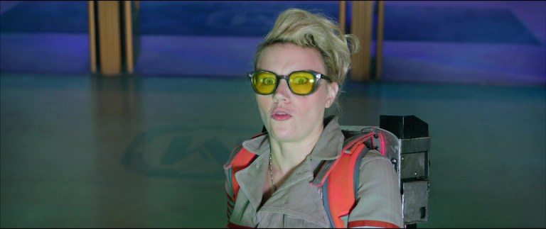 Jillian Holtzmann (Kate McKinnon) is intrigued by the team's latest opponent in Ghostbusters: Answer the Call (2016), Columbia Pictures