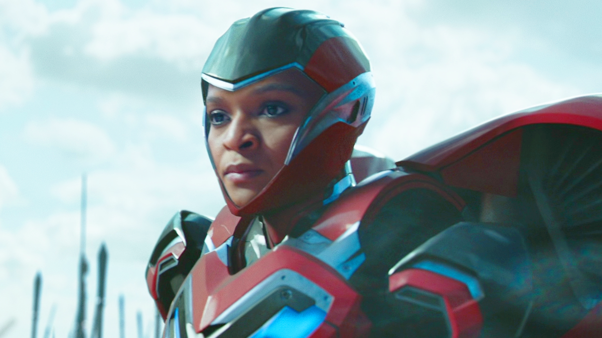 Riri Williams (Dominique Thorne) listens on as Shuri (Letitia Wright) declares victory in Black Panther: Wakanda Forever (2022), Marvel Entertainment