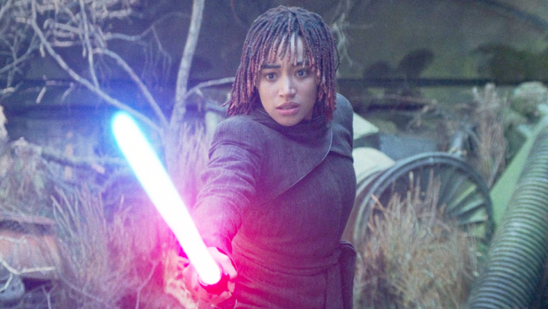 Osha (Amandla Stenberg) watches on as she begins Bleeding Master Sol's (Lee Jung-jae) lightsaber in The Acolyte Season 1 Episode 8 "The Acolyte" (2024), Disney