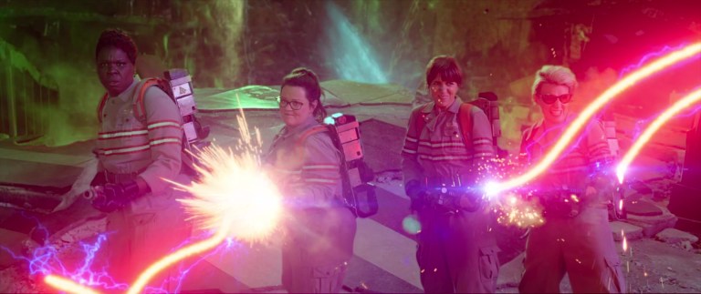 Erin Gilbert (Kristen Wiig), Jillian Holtzmann (Kate McKinnon), Abby Yates (Melissa McCarthy), and Patty Tolan (Leslie Jones) unleash their Proton Packs in Ghostbusters: Answer the Call (2016), Columbia Pictures