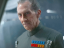 Grand Moff Tarkin (Peter Cushing) is unhappy with Director Krennic (Ben Mendelsohn) in Rogue One: A Star Wars Story (2016), Disney