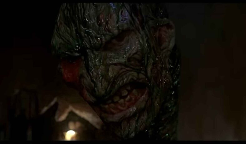 Snake Freddy is not happy about having his meal disturbed by old nemesis Nancy Thompson (Heather Langenkamp) in A Nightmare on Elm Street 3: Dream Warriors (1987), New Line Cinema