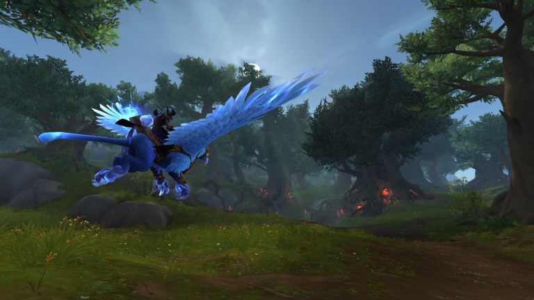 A player soars through a forest on an Algarian Stormrider in World of Warcraft: The War Within (2024), Blizzard Entertainment