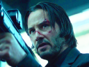 John Wick (Keanu Reeves) draws his Kel-Tec KSG on Viggo Tarasov (Michael Nyqvist) in John Wick (2014), Lionsgate