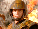 Johnny (Casper Van Dien) stands over a dead Bug in Starship Troopers (1997), Tri-Star Pictures