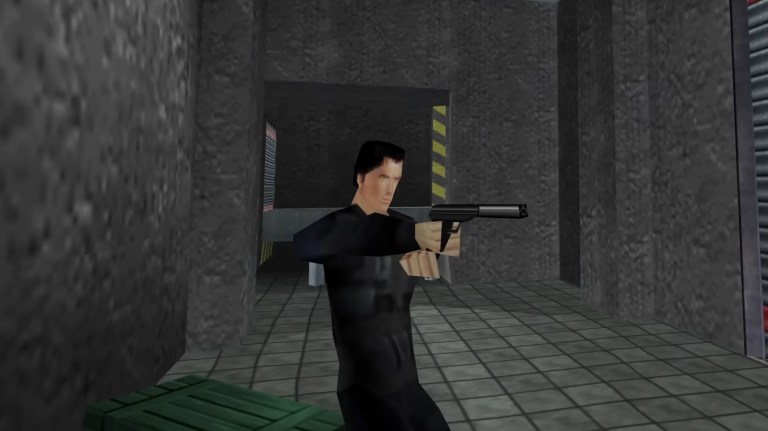 James Bond (Pierce Brosnan) readying his weapon before infiltrating a military base. GoldenEye 007 (1997), Nintendo of America Inc. 