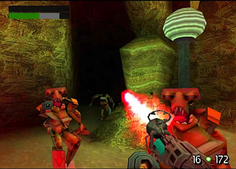 Player mowing down bug-like aliens in "Planet X" campaign mission. TimeSplitters (2000), Eidos Interactive.