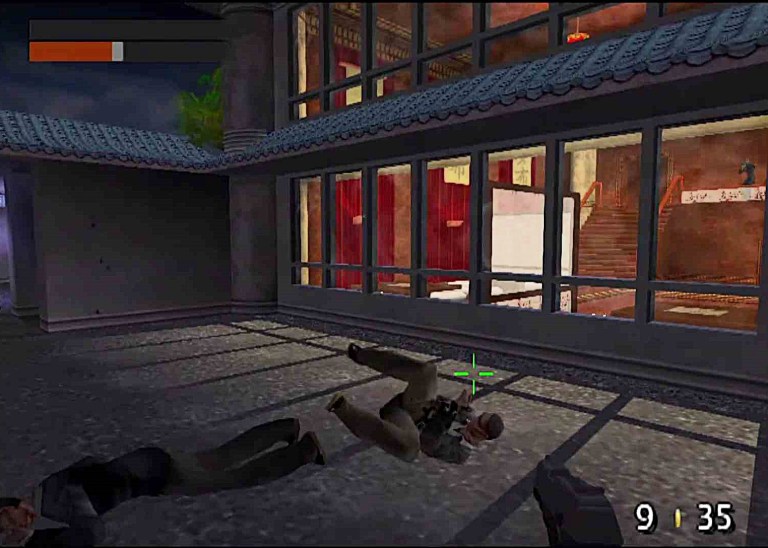 Player utilizing the "fine aim" mode on a rolling triad in the "Chinese" campaign mission. TimeSplitters (2000), Eidos Interactive.